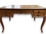 an image of a wooden desk with two drawers and a drawer