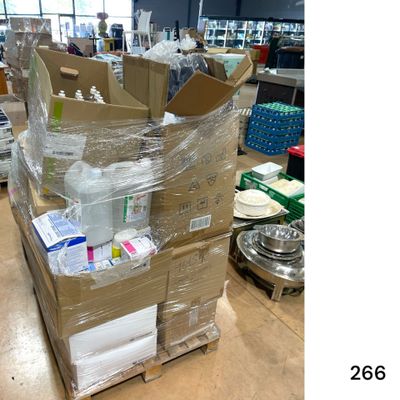 a large pile of boxes that are sitting on the floor