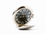 an image of a silver clock with roman numerals on a white background