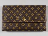 portefeuille Louis Vuitton avec finitions dorées