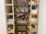 a closet with shelves and bins in it