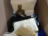 a cardboard box with a lot of items inside of it
