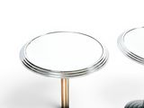 two small tables with mirrors on them on a white surface