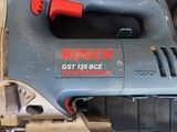 a bosch power tool sitting on top of a table