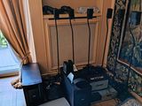 an image of a living room with a couch and a television