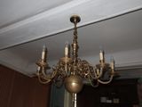 a chandelier that is hanging from the ceiling
