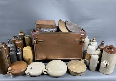 many different types of vases and containers on the table
