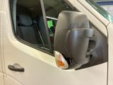 an image of a white truck with a side view mirror
