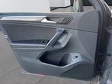 a door open of a car with the driver ' s side door open