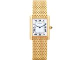 une montre-bracelet pour femme en or jaune, avec des chiffres romains et des chiffres romains