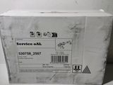 a box with a service oil label on it sitting on a table