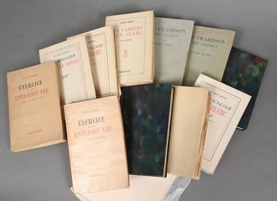 a lot of books that are sitting on a table