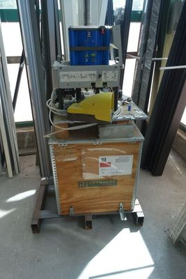 a machine that is sitting on a cart in a room