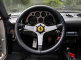a steering wheel and dashboard of a sports car