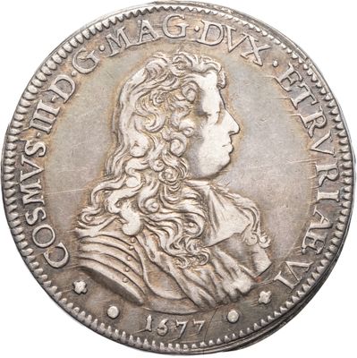 une pièce d'argent à l'effigie d'un homme aux cheveux longs
