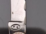a knife that is sitting on top of a table