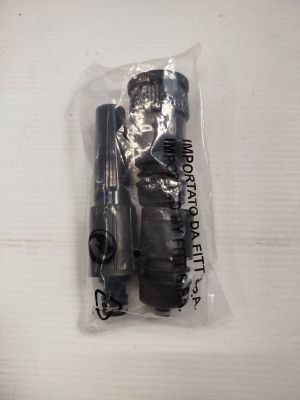 a small black object in a plastic bag on a table