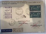une photo d'une carte postale sur laquelle figurent quelques timbres