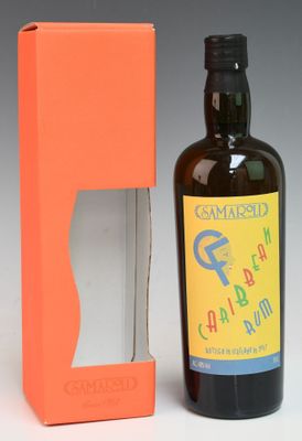 a bottle of wine that is next to a box