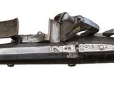 a close up of a gun on a white background with a white background