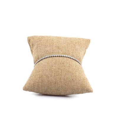 a close up of a pillow on a white background