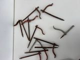 many different types of tools on a white surface