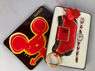 MONTRE SWATCH, NOS modèle GE201 modèle souris avec sa boîte …