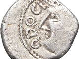 une pièce d'argent portant l'image d'un homme