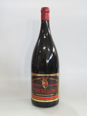 a bottle of wine that is sitting on a table