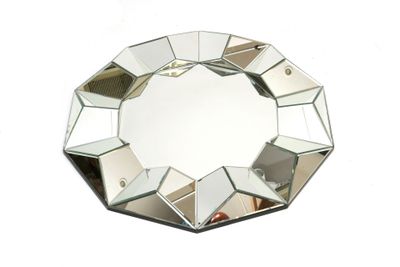 a mirror that is sitting on top of a table