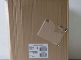 a cardboard box with a label on it sitting on a table