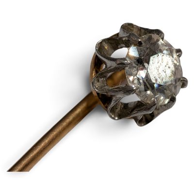 an image of a stick with a diamond on it