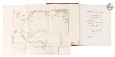 an open book with a map of africa on it