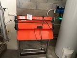 une image d'une machine qui se trouve dans une pièce