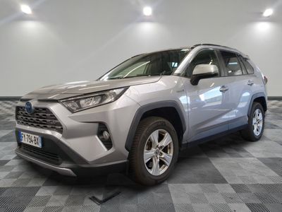 the toyota rav is parked on a checkered tile floor