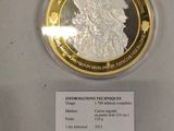 a gold coin with a picture of a woman on it
