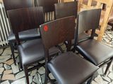 four chairs sitting in a row on the floor
