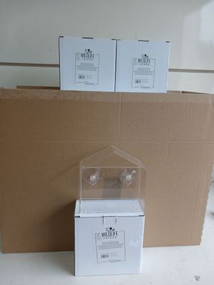 two boxes that are sitting next to each other on the floor