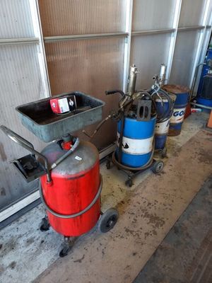 a red, white and blue fire extinguisher next to a blue and white fire extinguisher and a red and white fire exting