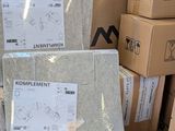 several boxes are stacked on top of each other in a warehouse