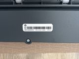 an image of a close up of a printer on a wooden table