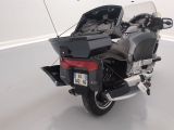 a motorcycle that is parked in a white room