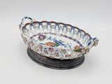 an image of a decorative bowl on a stand on a white surface