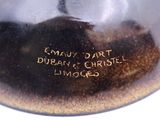 an image of a close up of a vase with writing on it