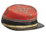 a red hat with a black band on it
