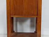 an image of a small wooden table with a marble top