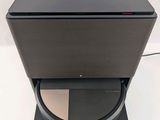 a close up of a laptop computer sitting on top of a stand