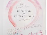 a book with a picture of a pink ring on it