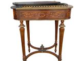 an image of a table with a piano on it