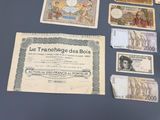 several different types of french currency laid out on a table